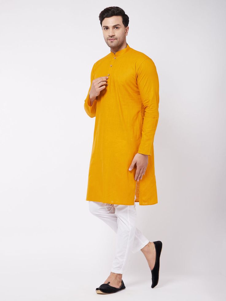 VASTRAMAY Men's Mustard And White Solid Cotton Blend Kurta With Cotton Pant set Experience timeless elegance with this stylish kurta set. Crafted from premium cotton blend fabric, it offers comfort and sophistication. Perfect for both casual and festive occasions. Features: Classic mustard and white color combination Soft and breathable fabric for all-day comfort Elegant design suitable for various occasions Specifications: Material: Cotton Blend Color: Mustard and White Sleeve Type: Full Sleeves Fit: Regular Material & Care: Hand wash or machine wash in cold water. Do not bleach. Iron on low heat. Dry in shade to preserve colors. Legal Disclaimer: The product is guaranteed to be 100% genuine. Product images are for illustrative purposes only. Images/packaging/ labels may vary from time to Classic Cotton Long Sleeve Kurta, Classic Long Sleeve Cotton Kurta, Classic Cotton Festive Sets, Classic Cotton Sets For Festive Occasions, Classic Festive Cotton Sets, Classic Fitted Cotton Kurta, Fitted Cotton Long Sleeve Set, Fitted Cotton Straight Kurta Set, Yellow Long Sleeve Cotton Kurta