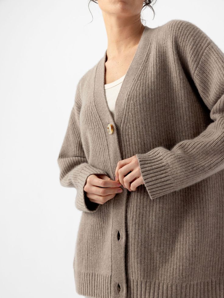 Experience modern luxury with our Sunday Oversized Cashmere Cardigan. Made from 100% cashmere, this ribbed cardigan wraps you in refined comfort and elegance. With an oversized fit, perfect for all-season layering, our cashmere cardigan is versatile enough to be dressed up or down. Due to the inherent quality of the natural fibers, you may notice slight shedding. Women's Oversized Sunday Cashmere Cardigan in Black (Size: X-Small) - Cozy Earth Oversized Ribbed V-neck Outerwear, Oversized V-neck Ribbed Outerwear, Winter Cashmere Cardigan For Daywear, Winter Cashmere Cardigan, Classic Ribbed Cashmere Outerwear, Elegant Oversized Cashmere Cardigan, Elegant Cashmere Cardigan With Relaxed Fit, Oversized V-neck Cashmere Cardigan, Ribbed Long Sleeve Cashmere Outerwear