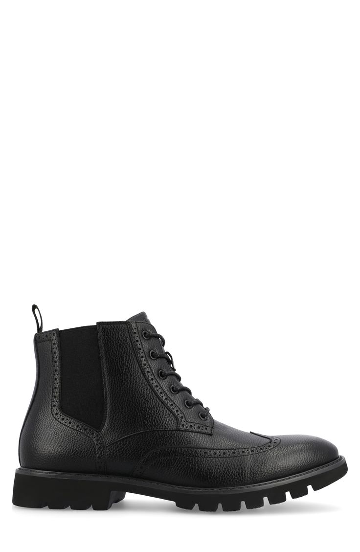 Elevate your work-to-weekend look in this refined faux-leather boot updated by a brogue-detailed wingtip and a heavily lugged sole. 5" shaft Synthetic upper/textile lining/rubber sole Imported Black Brogue Ankle Lace-up Boots, Business Wingtip Lace-up Boots With Brogue Detailing, Classic Chelsea Boots With Lug Sole For Work, Elegant Wingtip Chelsea Boots For Work, Classic Combat Boots Plain Toe For Workwear, Formal Wingtip Boots With Textured Sole, Casual Wingtip Lace-up Boots For Work, Classic Combat Boots For Workwear, Wingtip Lace-up Boots With Brogue Detailing For Business