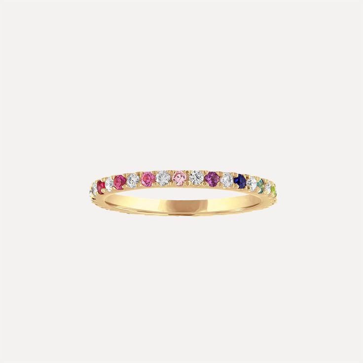 Details: This gorgeous, multicolor Rainbow & Diamond Eternity Band in 14k gold features pavé set color stones alternating with white diamonds all the way around creating an ombré effect. It is delicate and perfect for stacking with your favorite rings or even as an addition to any wedding ring stack. Shop the look: Honeycomb Band, Mini Mini Letter Chain Ring, and Mini Letter Ring Diamonds: 0.25 carats, G color, VS2 clarity Color Stones: Amethysts, Topaz, Ruby, and Sapphires Width: 1.5mm Availabl Wedding Ring Stack, Rings Making, Rainbow Diamond, 2024 Style, Diamond Eternity Band, Letter Ring, Color Stones, Ring Stack, Mini Mini