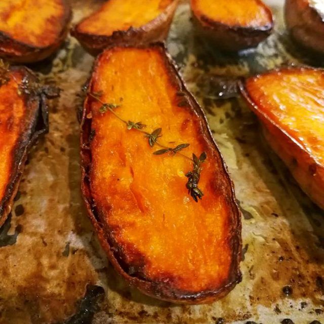 some sliced up sweet potatoes on a cutting board