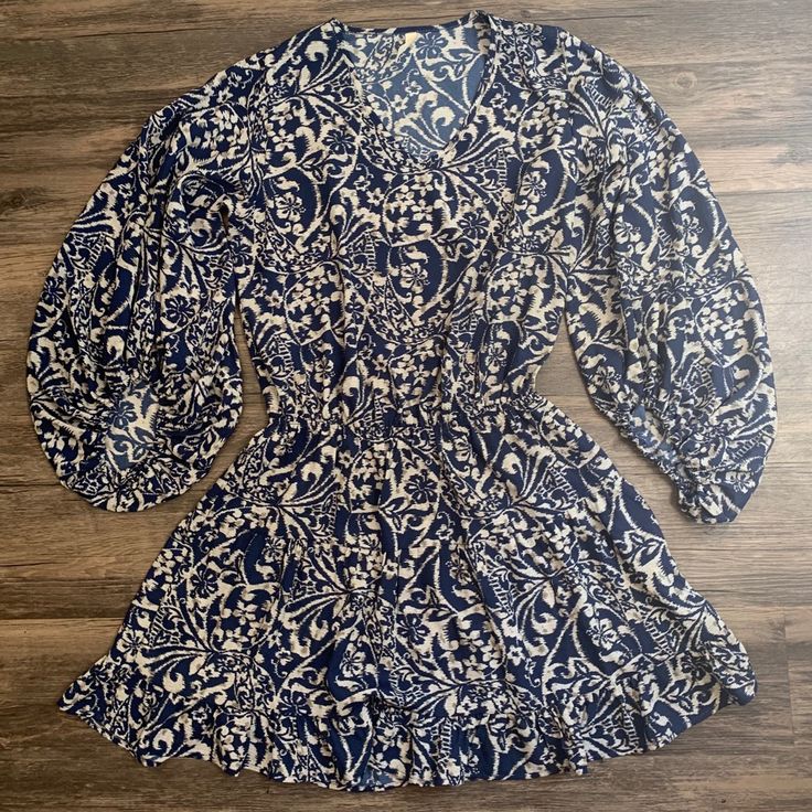 Reposhing This Item. Never Worn By Me! I Love It But It’s Too Short Since I’m Curvy. Features Bubble Sleeves, V-Neck, And Elastic Waist. Make Me An Offer! Printed V-neck Dress For Date Night, Blue Floral Print V-neck Mini Dress, Blue Dress With Surplice Neckline For Beach, Blue Surplice Neckline Dress For Beach, Blue Surplice Neckline Dress For The Beach, Blue Printed Dresses With Surplice Neckline, Blue V-neck Sundress Mini Dress, Blue V-neck Sundress, V-neck Mini Dress With Ruffle Hem For Casual Wear