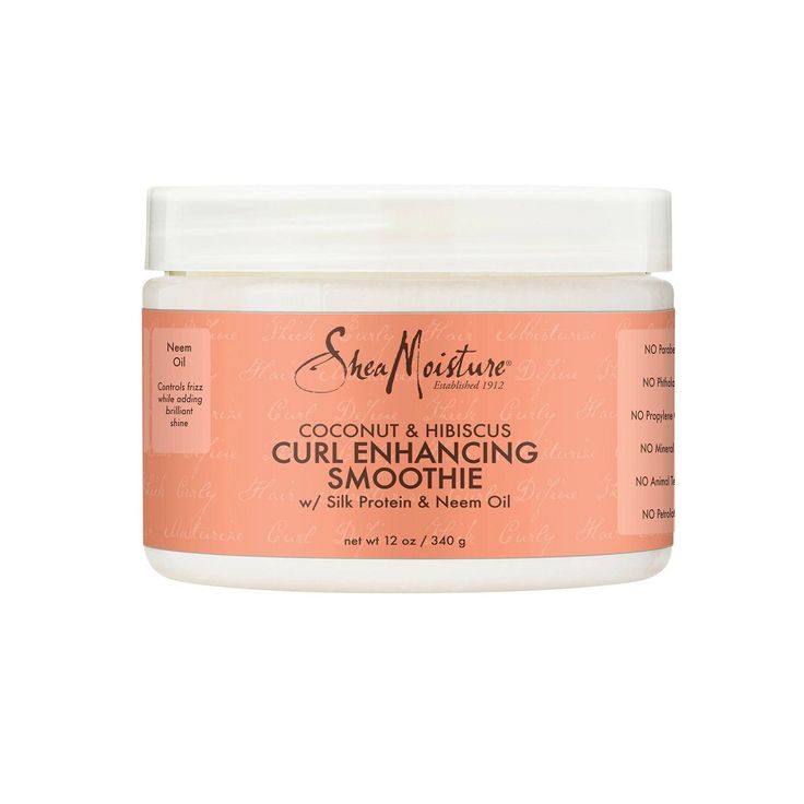 Shea Moisture Coconut and Hibiscus Curl Enhancing Smoothie for Thick, Curly Hair 12 oz. is enriched with natural ingredients to give you soft, silky and defined curls! Enriched with certified organic Shea Butter, this conditioning enhancing smoothie smooths split ends and tames stray flyaways giving your natural hair gloriously shiny, bouncy curls! Our award-winning curl enhancing smoothie helps to define curls, reduces frizz and smoothes hair for a soft, silky feel. This hair cream for curls re Smooth Curly Hair, Best Curl Cream, Shea Moisture Coconut, Curl Enhancing Smoothie, Coconut Hibiscus, Curl Defining Cream, Daucus Carota, Shea Moisture, Thick Curly Hair