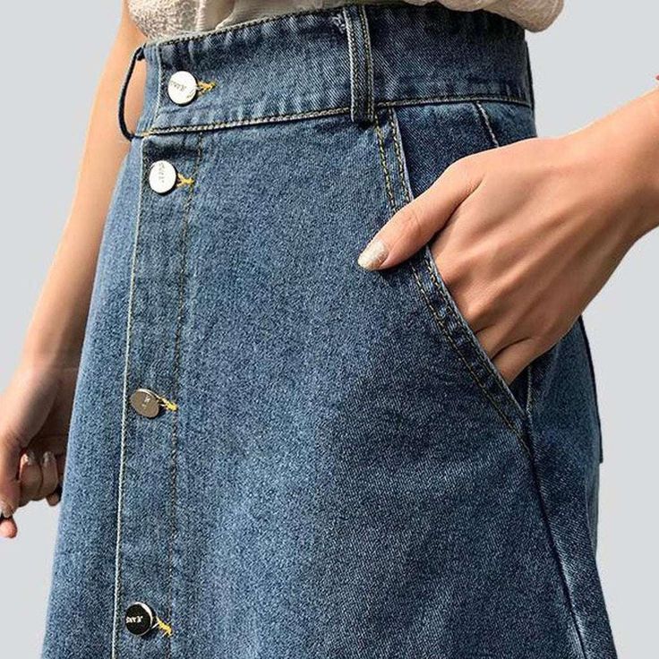 Make a bold statement this spring with our street-style inspired 2023 Spring-Summer a-line button-down denim skirt! Crafted with a high-waisted. slim fit silhouette and classic buttoned closure. this vintage-inspired piece is the perfect balance of fashion and comfort.Key Highlights: A-line Silhouette: Perfectly captures the effortless look of a vintage skirt with a contemporary. a-line fit. Buttoned Closure: Crafted with classic buttons for a timeless look. High-waisted Fit: Designed to hug you Trendy Non-stretch Button-up Jeans, Non-stretch Mid-rise Denim Skirt For Spring, Mid-rise Cotton Denim Skirt With Button Closure, Trendy Summer Denim Skirt, Spring Non-stretch Denim Skirt, High Waist Denim Skirt For Spring, High Waist Denim Skirt For Fall, Trendy Wide Leg Denim Skirt For Spring, Summer Straight Leg Skirt With Button Closure