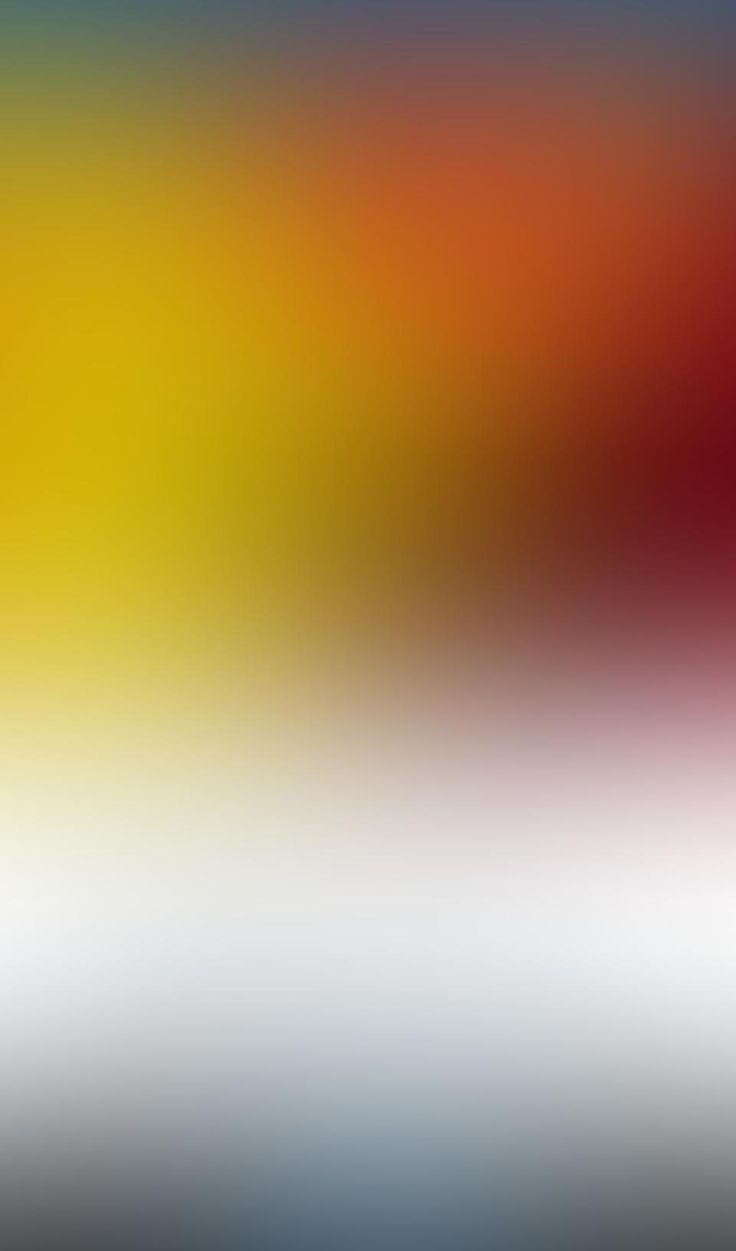 an abstract blurry background with red, yellow and blue colors