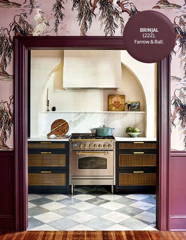 a kitchen with an oven, stove and counter top in it's door way