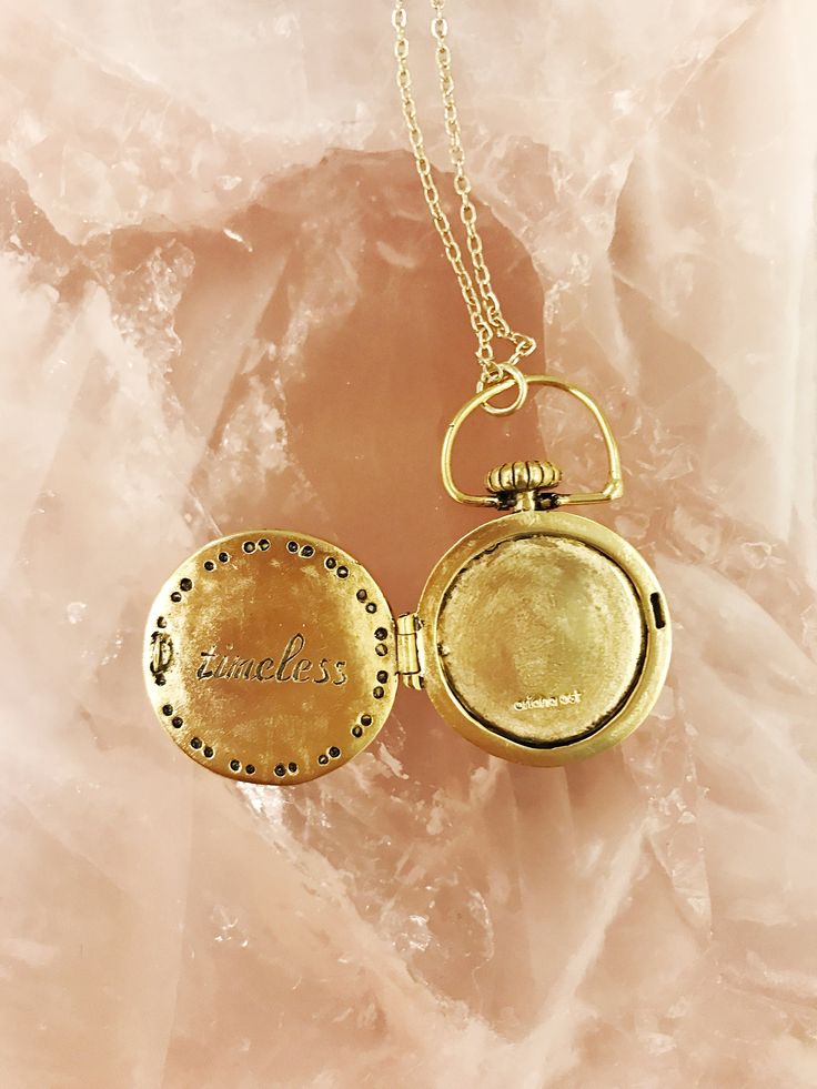 If only time stood still... don't we all just wish time froze for some of our most precious moments. Our design captures that emotion. Engraved with timeless inside and the clock set at 11:11 so we can make a wish to be transported into any time we desire. Time is the only thing we can never get back used every second to its very best potential. I hope this gold chain locket inspires you to take yourself into any moment you imagine. Hand sculpted in wax and cast into brass, plated in gold and ac Gold-tone Brass Jewelry For Anniversary, Gold-tone Brass Jewelry As A Gift, Gold-tone Brass Jewelry For Gifts, Keepsake Yellow Gold Brass Locket Necklace, Keepsake Yellow Gold Locket Necklace In Brass, Timeless Pendant Locket Necklace For Anniversary, Yellow Gold Brass Locket Necklace For Keepsake, Timeless Pendant Locket Necklace For Wedding, Antique Gold Brass Necklace For Keepsake