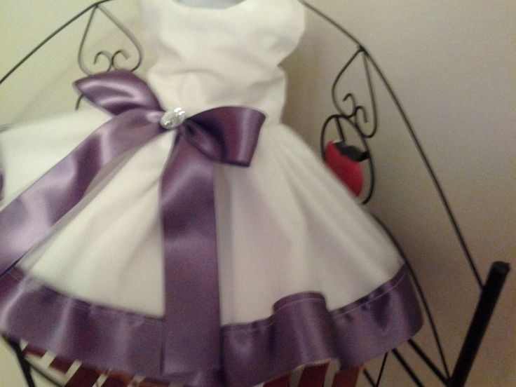 This dress can be custom made. The base color is white and you can choose any of the colors of ribbons listed for color combination. Please Message me your dogs measurements before purchasing. This beautiful dress is a head turner and is perfect for your furbaby. This dress is handmade from cotton blend material and satin ribbon. It is a beautiful amethyst purple and white color combination. It has a layer of white tulle overlaying on top of the skirt. It has a large satin bow centered at the wa White Ribbon Dress For Dress-up, White Dress With Ribbon For Dress-up, Elegant Beauty, Pet Dress, White Tulle, Amethyst Purple, Dog Dresses, Satin Bow, Purple And White