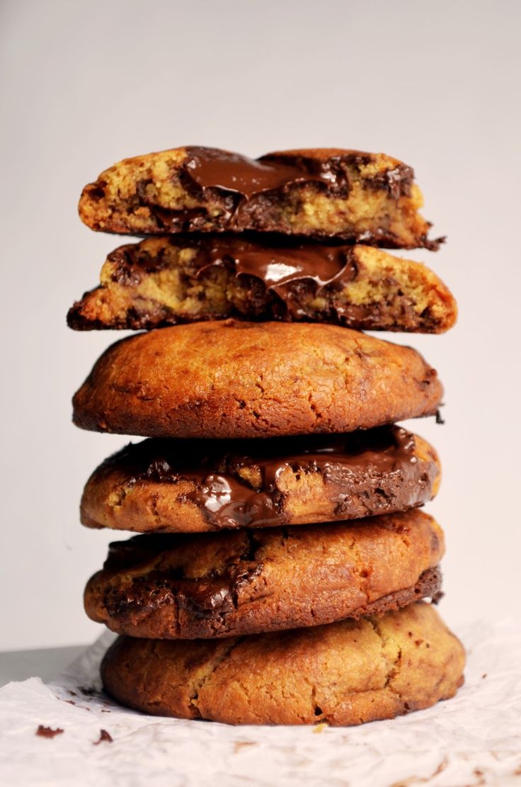 chocolate chip cookies stacked on top of each other