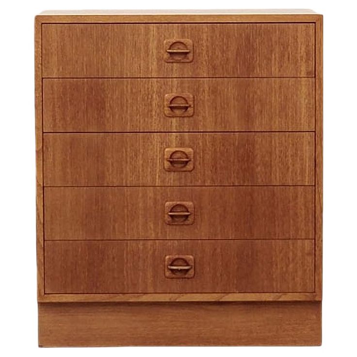 a wooden chest of drawers with five drawers on each drawer and four pulls at the bottom