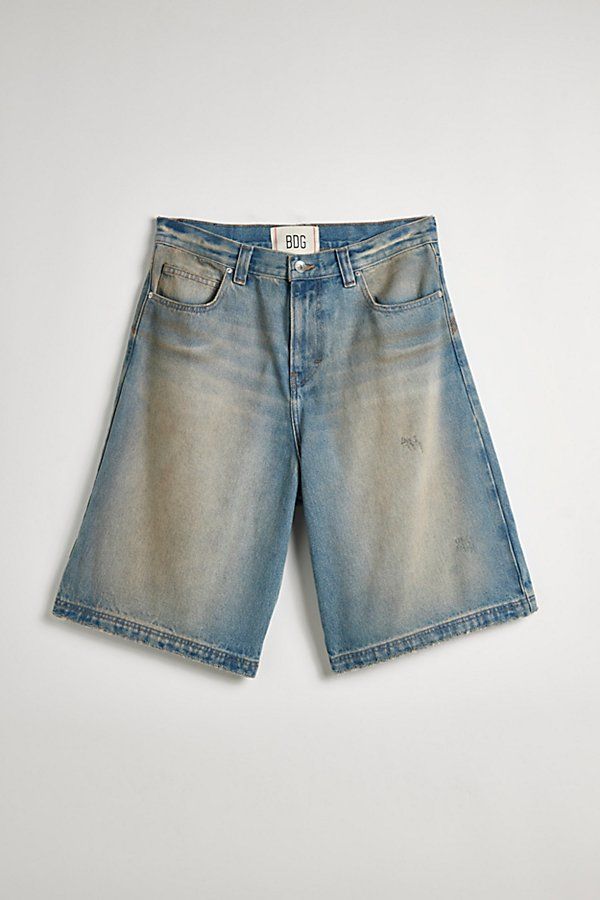 Oversized BDG baggy jorts in premium BDG denim. Longline denim shorts with a relaxed fit and zip fly. Urban Outfitters exclusive. Features BDG Astro baggy denim jorts Longline denim shorts Mid rise waist Rigid BDG denim Loose longline fit 5-pocket; zip fly UO exclusive Content + Care 100% Cotton Machine wash Imported Size + Fit Model in Dark Green 6'1.5" and wearing size 32 Measurements taken from size 32 Rise: 14" Inseam: 11.5" Leg opening: 12.5" | BDG Astro Baggy Denim Jort in Light Blue, Men' Denim Jorts, Baggy Denim, Urban Outfitters Jeans, Blue Fits, Basketball Shorts, Mens Bottom, Exclusive Collection, Christmas List, Dark Green