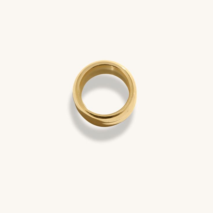 The 18K Gold Plated Maeve Ring, designed with simplicity in mind. The perfect accessory for every occasion. It looks beautiful on its own, or stacked with your other favourites, whatever you choose, you can't go wrong with this one. When you're not wearing this piece, tuck it away in your very own Milou jewellery box provided. Stainless Steel, plated with 18K Gold Waterproof (Tarnish Resistant) Natural Linen Milou Jewellery Box Included For ring sizing, please see our Size Guide for details FREE Everyday Gold Stackable Wide Band Rings, Gold Stackable Wide Band Rings For Everyday, Gold Wide Band Stackable Rings For Everyday, Modern Yellow Gold Wide Band Ring For Everyday, Everyday Yellow Gold Wide Open Band Ring, Everyday Gold Wide Band Ring, Minimalist Gold Stackable Rings With Wide Band, Yellow Gold Wide Band Ring For Everyday, Minimalist Yellow Gold Wide Band Ring For Everyday