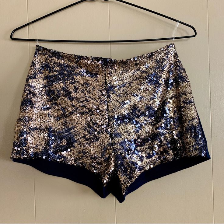 Bejeweled Stylish Shorts Navy With Gold/Rose Gold Fixed Sequins On Front 100% Polyester Zipper Closure On Back Made In Usa New With Tags Sequin Party Shorts, High Waist Embellished Party Bottoms, Party Shorts With Sequins, Chic Sequin Party Shorts, Embellished High Waist Party Bottoms, Party Sequined Shorts, Embellished High-waisted Party Bottoms, High-waist Embellished Bottoms For Party, Embellished High Waist Bottoms For Party