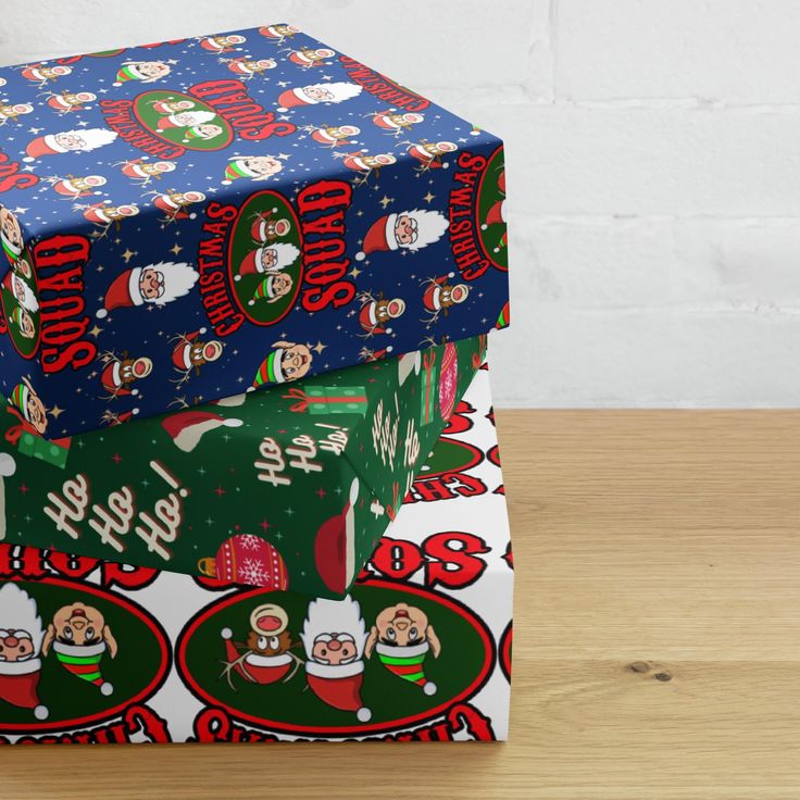 two wrapped presents sitting on top of each other