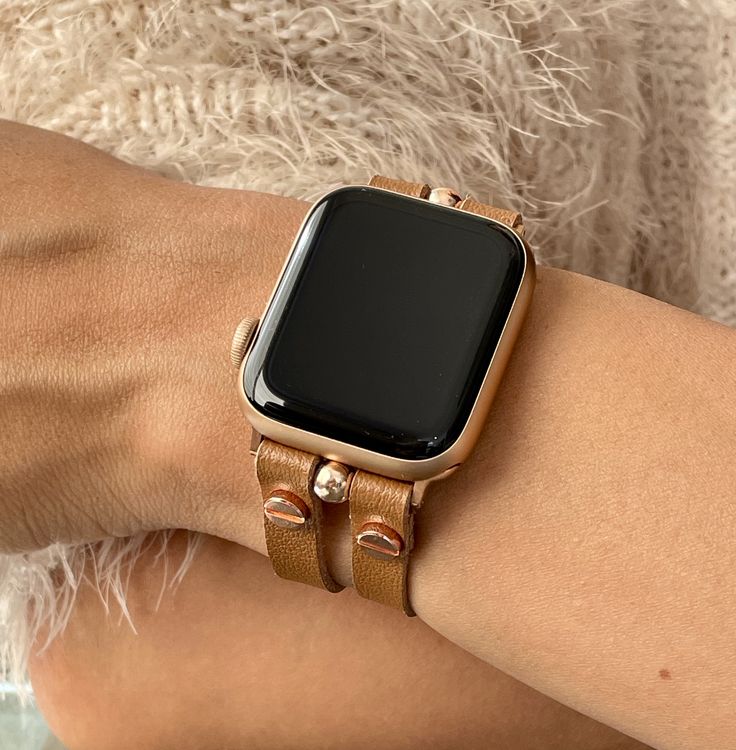 High Quality Italian Tan Color Vegan Leather Strap Bracelet. Double Strapped 7mm Strap with Adjustable Buckles. Gorgeous Design Bracelet Tailored to Perfection. Designed And Handmade by Simeon D Jewelry Studio. This Bracelet Fits ALL Apple Watch Series. Please Measure Your Wrist Before Submitting Your Order! Not For Other Models. Apple Watch Is NOT Included. Ultra Fiber Vegan Leather: -Moisture-Wicking and Heat-Dispensing -Water-Washable -Breathable -Lightweight Let's be Friends! Follow my Studi Trendy Adjustable Leather Strap Apple Watch Band, Rose Gold Bracelet Strap Apple Watch Band, Gold Rectangular Leather Strap Apple Watch Band, Gold Rectangular Leather Apple Watch Band, Gold Rectangular Apple Watch Band With Leather Strap, Rose Gold Watch Band For Fashion Accessory, Rose Gold Watch Bands With Bracelet Strap, Gold Leather Strap Apple Watch Band For Everyday, Everyday Gold Leather Strap Apple Watch Band