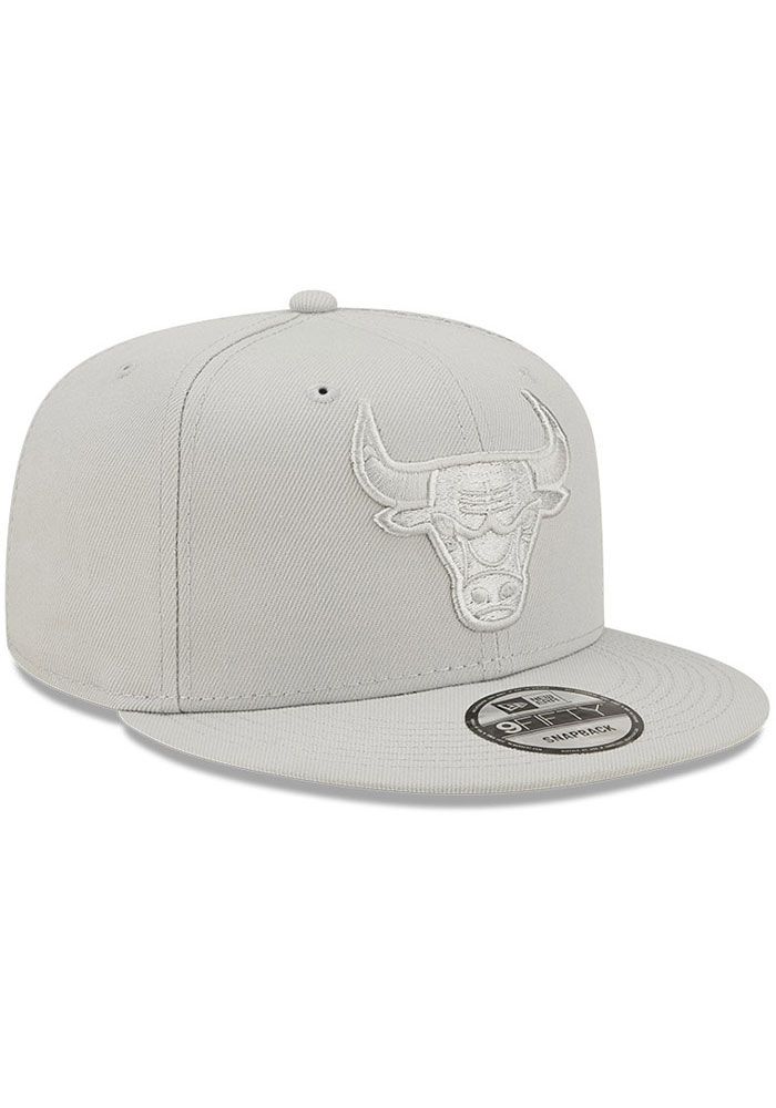 Wear your Bulls style with pride in this Chicago Bulls New Era Silver Tonal Pack 9FIFTY Snapback Hat! This Chicago Snapback Hat features a front embroidered team logo on a structured polyester crown with flat visor and snap closure. Go Bulls! Front embroidered logo, Fashion alternate colorway, Side New Era Flag, Back plastic snapback, Adjustable closure, Polyester material, Polyester, Wipe clean with cloth or cleaning kit, 4 Gray Snapback Hat For Baseball Season Streetwear, Embroidered Logo Snapback Hat With Flat Bill, Gray Hat With Embroidered Logo For Streetwear, Snapback Hat With Embroidered Logo, One Size, Gray Snapback Hat For Baseball Season, Snapback Hat With Embroidered Logo, Gray Flat Bill Baseball Cap With Embroidered Logo, Snapback Hat For Fan Gear With Flat Brim, Gray Flat Bill Snapback Hat For Baseball Season