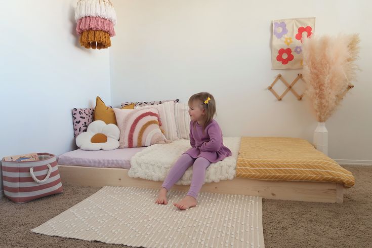 Montessori inspired floor bed made in Canada.  Ships in 3-4 weeks. MATERIAL Made out of high quality Canadian pine wood. Each piece is hand selected from the lumber yard and hand sanded to a smooth finish. All edges are beveled. Hardware included.  Slats are included and sit roughly 2" off the floor. LEGS Adding a set of legs are optional with this frame and can be added later when your little one has outgrown the floor frame. To have a set of legs and hardware included with your frame choose th Floor Bed Without Frame, Toddler Mattress On Floor, Kids Floor Bed Ideas, Floor Bed Ideas Small Spaces, Toddler Bed On Floor Ideas, Bed Without Frame On Floor, Floor Bed Bedroom, Floor Bed Decor Ideas, Floor Bed For Toddler