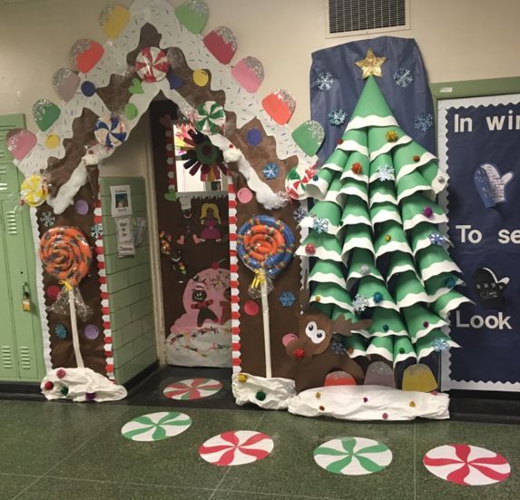 christmas decorations in the hallway of a school