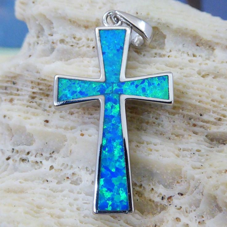 This listing contains multiple links, photos and a detailed description and dimensions keep scrolling down for additional information!) If you have any other questions, please don't hesitate to ask. Genuine .925 Sterling Silver cross pendant with inlaid Blue Opal details high polished Rhodium plate finish. pendant See more religious items here. https://www.etsy.com/shop/BestJewelryByFrank?ref=seller-platform-mcnav&section_id=37587628 Product Type: 925 Sterling Silver pendant Product dimension pe Symbolic Blue Engraved Jewelry, Collectible Blue Sterling Silver Jewelry, Blue Symbolic Collectible Jewelry, Silver Cross Pendant Jewelry For Commemoration, Blue Crucifix Jewelry As Gift, Blue Crucifix Jewelry For Gift, Collectible Blue Spiritual Jewelry, Blue Sterling Silver Crucifix Jewelry, Blue Spiritual Collectible Jewelry