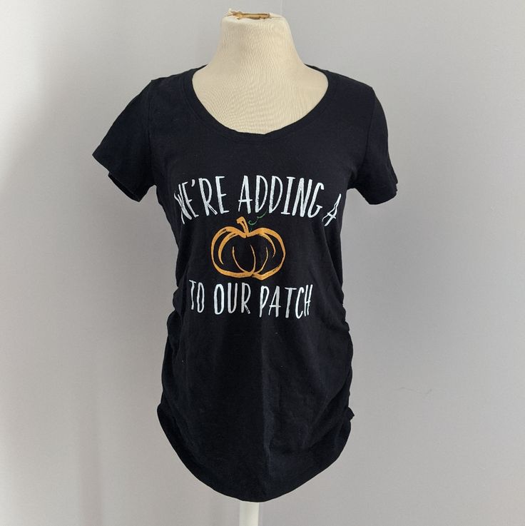 We're Adding A Pumpkin To Or Patch Maternity Shirt. Worn Once. Basically Brand New. Maternity Black Cotton T-shirt, Black Maternity T-shirt Crew Neck, Black Short Sleeve Maternity Top, Announcement Ideas, Pregnancy Announcements, Black Floral Top, Maternity Shirt, Pregnancy Announcement Shirt, Maternity Tees