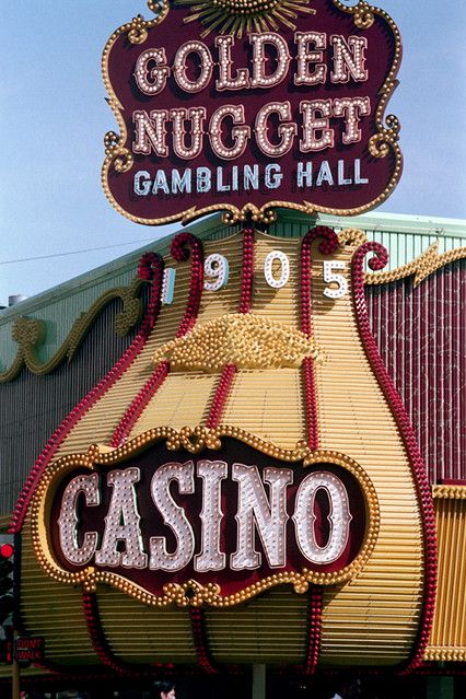 the golden nugget gambling hall in las vegas has been decorated with neon signs