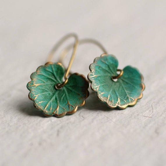 These leaf earrings are brass charms with some amazing detail, which have been carefully treated, painted and varnished to bring out beautiful tones and depth of colour! They look like beautiful watercoloured lily pads! Each leaf is 15mm long (about the size of a thumbnail) and are available in two Watercolour Lily, Art Nouveau Earring, Boho Turquoise, Earrings Leaf, Turquoise Boho, Brass Charms, Periwinkle Blue, Diy Schmuck, Enamel Jewelry