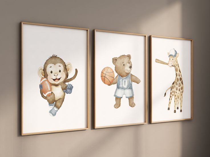 three pictures of animals hanging on the wall