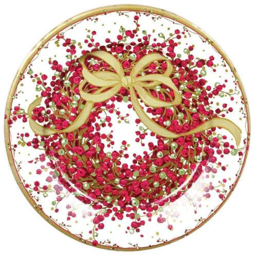 a plate with red and gold sprinkles in the shape of a bow