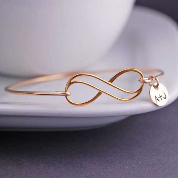 Personalized Gold Infinity Bangle Bracelet by georgiedesigns Adjustable Bracelets For Anniversary Gift, Elegant Infinity Jewelry For Friendship, Rose Gold Infinity Bracelets For Friendship, Infinity Bracelets For Anniversary On Mother's Day, Infinity Bracelets For Anniversary And Mother's Day, Adjustable Gold Infinity Jewelry, Adjustable Infinity Gold Jewelry, Personalized Infinity Jewelry For Bridesmaid Gift, Gold Infinity Bracelet Adjustable