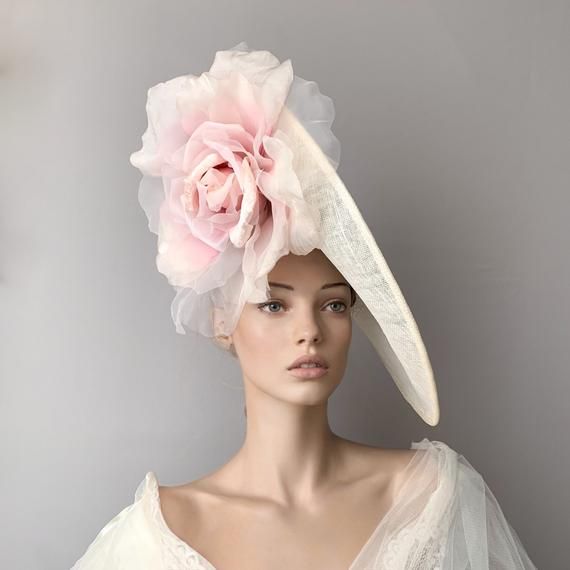 Elegant cream and soft pink big floral Kentucky derby straw hat for woman.This  white fascinate hat is hand blocked using traditional techniques and is embellished with a stunning silk flower.It is a perfect hat for weddings, Royal Ascot horse races, cocktails, derby, luncheons, high tea parties, kentucky derby...It is mounted on a headband.If you want, you can choose the side of the head were you like to wear the fascinator, just convo me.Any color of the fascinator can be changed to order. ** Cream Cloche Hat For Church And Kentucky Derby, Cream Cloche Hat For Spring Church Event, Wide Brim Fascinator With Handmade Flowers For Garden Party, Elegant Fascinator For Royal Ascot Church, Elegant Fascinator For Church And Royal Ascot, Elegant Fascinator For Church At Royal Ascot, Wide Brim Hats With Handmade Flowers For Royal Ascot, Elegant High Crown Hat For Spring, Elegant Kentucky Derby Straw Hat For Races