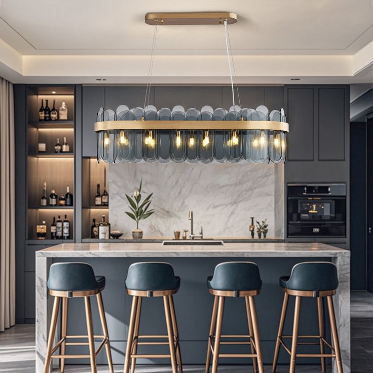 a kitchen with marble counter tops and bar stools