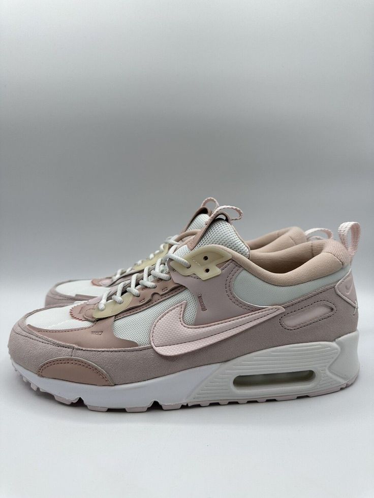 Elevate your sneaker game with these Nike Women's Air Max 90 Futura in size 10. Featuring a colorful design with pink, white, and barely rose hues, these sneakers are perfect for adding a pop of color to any outfit. The low top shoe shaft style and athletic performance make them great for activities like boxing. Customized with the Style Code DM9922-104, these sneakers are part of Nike's Air Max product line and are suitable for women in the UK shoe size 7.5, US shoe size 10, and EU shoe size 42. These sneakers are the perfect addition to any sneaker collection, offering both style and comfort. Pink Boost Midsole Lace-up Sneakers, Pink Lace-up Sneakers With Boost Midsole, Sporty Pink Custom Sneakers With Gum Sole, Sporty Custom Pink Sneakers With Gum Sole, Pink Custom Sneakers With Boost Midsole For Light Sports, Pink Custom Low-top Sneakers For Light Sports, Pink Low-top Custom Sneakers For Light Sports, Pink Athleisure High-top Sneakers With Boost Midsole, Pink Cushioned High-top Sneakers For Athleisure