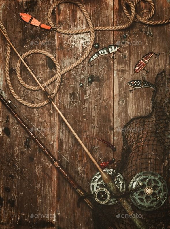 an old wooden background with fishing gear and rope