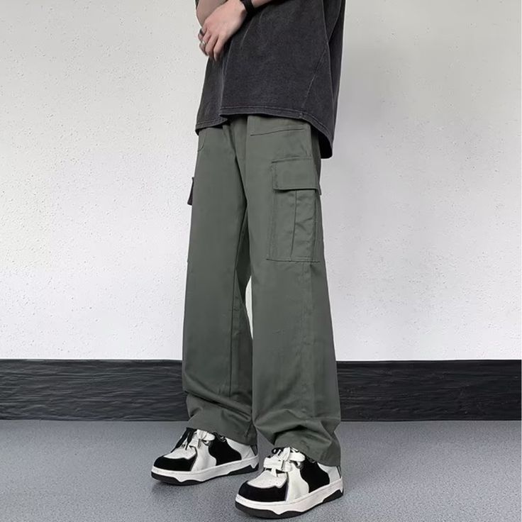 Our Casual Literary Straight Cargo Pants are an essential piece for any stylish look. Boasting a sophisticated solid color and deep pocket detail, these premium pants are the perfect balance of casual and literary. Ideal for any occasion, you'll feel both comfortable and confident in these urban-chic trousers. Features: -100% Cotton -Mid-rise waist -Solid Color -Straight Leg -Regular Fit -Casual style Urban Wide-leg Pants With Pockets, Solid Ankle-length Work Pants With Welt Pockets, Casual Straight Leg Cargo Pants With Multiple Pockets, Casual Straight Cargo Jeans With Pockets, Casual Khaki Straight Cargo Jeans, Casual Khaki Cargo Jeans With Straight Fit, Casual Wide Leg Cargo Pants With Patch Pockets, Casual Cargo Pants With Patch Pockets, Relaxed Fit Jeans With Pockets, Ankle-length