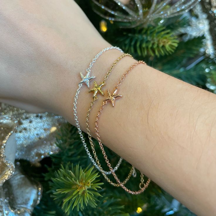 Our Capeology starfish bracelet represents change and growth. Starfish are known for renewal and self-sustainability. Wear this bracelet and you'll always remember to trust your instincts and explore new possibilities and opportunities. This piece is made out of sterling silver and is complete with a lobster claw clasp. The chain is adjustable and has the option to be worn at 7.0, 7.5, or 8.0 inches in length. The back of the bracelet is engraved with "CAPEOLOGY." Proudly made in the USA. Keep y Elegant Starfish Bracelet For Gift, Adjustable Starfish Casual Bracelets, Starfish Charm Bracelet As A Gift, Silver Star Charm Jewelry For Friendship, Starfish Charm Bracelet As Gift, Silver Bracelets With Star Charm For Friendship, Silver Friendship Bracelets With Star Charm, Silver Bracelet With Star Charm For Friendship, Starfish Charm Bracelet Gift