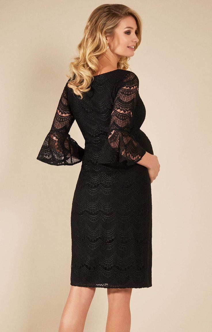 Striking yet chic, Jane is a maternity must-have inspired by vintage shapes with classic appeal. A gorgeously soft, curve-hugging silhouette with pretty lace sleeves that flare from the elbow. Simple and flattering to wear for dressy days or understated evenings. •Dramatic black eyelash lace •Vintage inspired iconic shift shape •Sheer lace sleeves fluted from elbow •Flattering soft boat neckline •Subtle stretch to grow with you •Baby-soft premium jersey lining •Lovingly designed and made in Brit Elegant Fitted Midi Maternity Dress, Elegant Fitted Maternity Midi Dress, Elegant Fitted Midi Dress For Maternity, Maternity Dress With Lace Trim, Fitted Maternity Dress With Lace Trim, Fitted Maternity Dress With Lace Sleeves, Fitted Scallop Lace Maternity Dress, Maternity Scallop Lace Fitted Dress, Maternity Fitted Lace Dress With Scalloped Lace