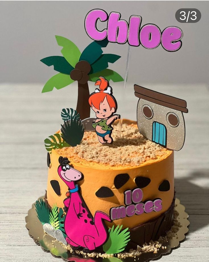 a birthday cake decorated with cartoon characters