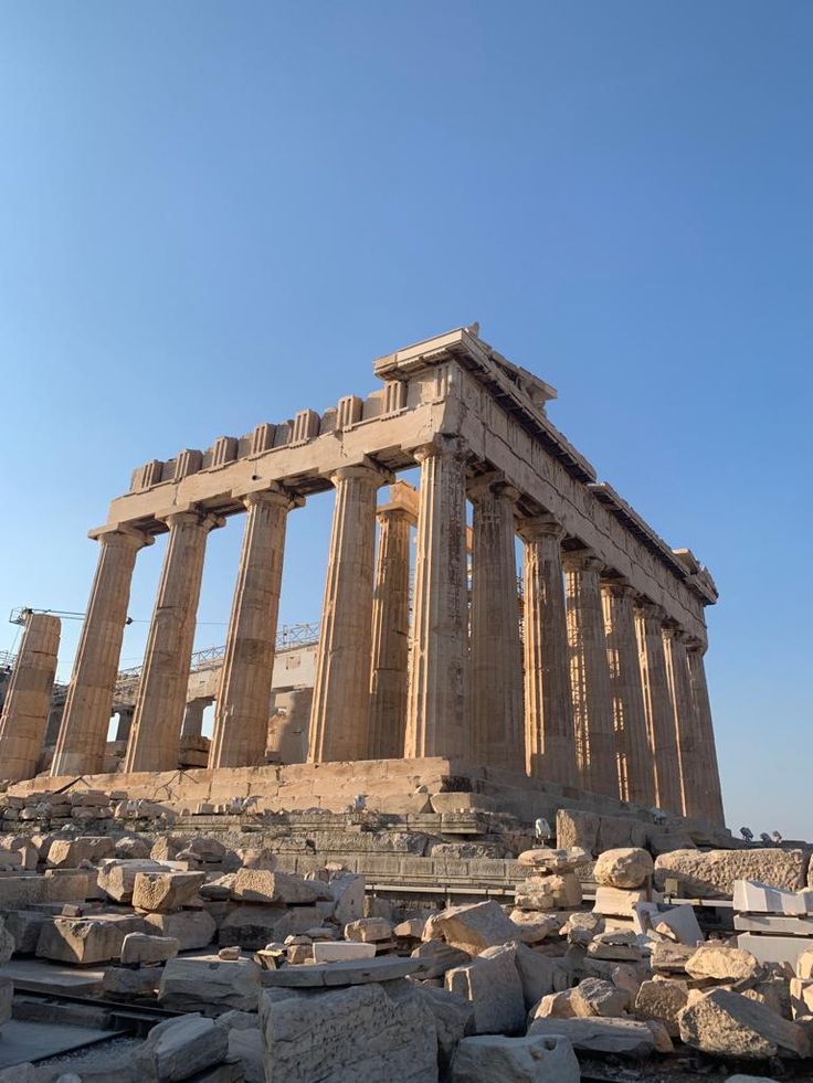 the part of an ancient greek temple surrounded by rocks