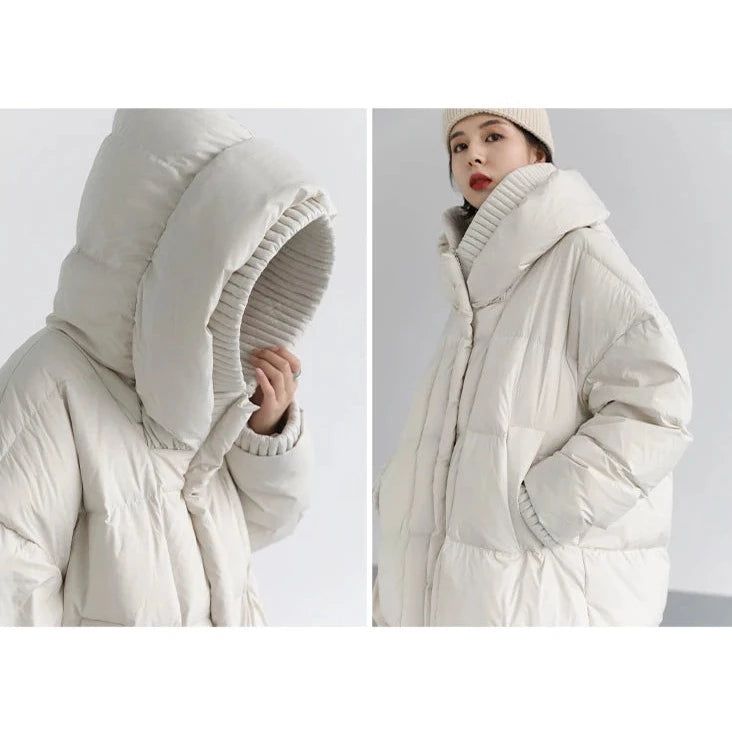 Material: 50% Polyester, 50% Nylon Step into winter with style in our Loose Hooded Long White Winter Jacket. This jacket combines the comfort of a loose fit with the elegance of a long silhouette, ensuring you stay cozy and fashionable. Embrace the season with confidence, wrapped in the warmth and versatility of this chic white winter jacket. Elevate your winter wardrobe with this timeless piece. Care: Machine Wash: Wash the jacket in cold water on a gentle cycle to preserve the fabric and color White Winter Jacket, Duck Down Jacket, Sleeveless Jacket, White Ducks, Warm Coat, Stay Cozy, Winter White, Winter Wardrobe, Timeless Pieces