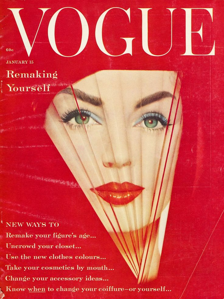 an old magazine cover with a woman's face and fan on the front page