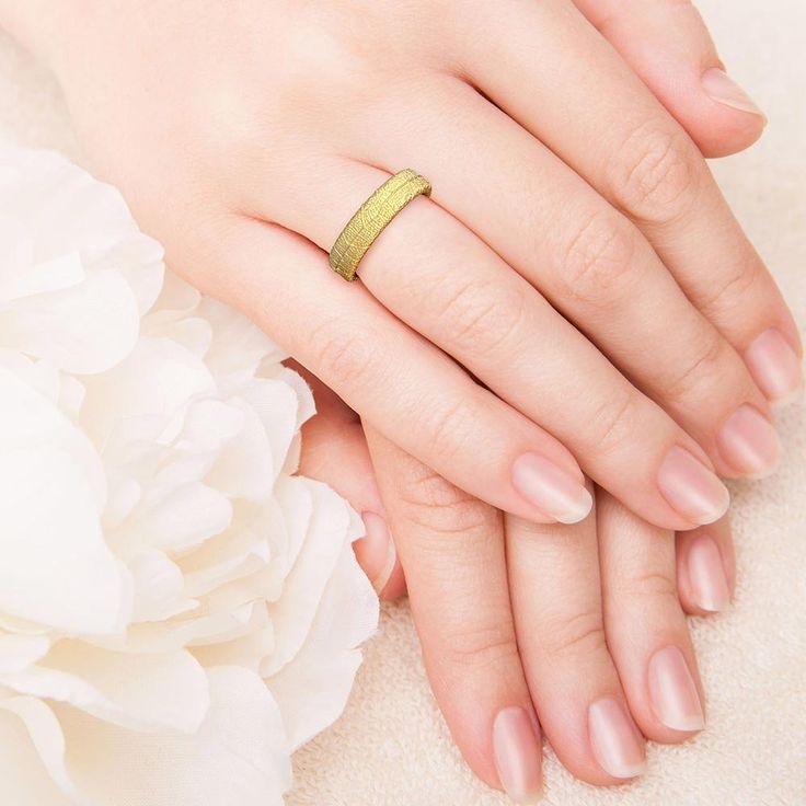 Discover timeless elegance with our exquisitely crafted Italian wedding band in 14k or 18 karat gold. Adorned with a delicate leaf motif surrounding the entire ring, this nature-inspired masterpiece captures the essence of eternal love. This stunning gold wedding band is a symbol of refined beauty and exquisite craftsmanship. 14k or 18k gold 5 mm wide with rectangular section everyday ring engagement ring, wedding ring nature inspired designed and crafted in Italy Heirloom Gold Ring For Promise, Rose Gold Engraved Wedding Ring, Round Band, Fine Jewelry Gold Promise Rings, Gold Promise Rings In Fine Jewelry Style, Gold Fine Jewelry For Promise, Minimalist Wedding Ring With Diamond Cut Engraving, Delicate Gold Engraved Wedding Ring, Delicate Gold Engraved Ring For Wedding, Delicate Yellow Gold Promise Ring