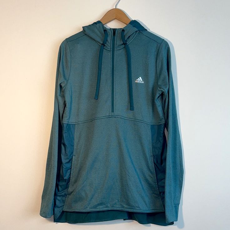 Adidas Climawarm Transition Running Top Pullover. Half Zipper. Teal Green. Thumb Holes. Hooded With Drawstrings. Measurements (Approximate): Shoulders Seam To Seam- 15” Sleeves Seam To Cuff - 27” Length- 24” Front, 26�” Back Chest Armpit To Armpit -40” New With Tags. Green Half-zip Activewear For Sports, Functional Adidas Activewear For Outdoor Activities, Adidas Functional Activewear For Outdoor Activities, Green Half-zip Athleisure Activewear, Green Sports Activewear Hoodie, Athleisure Half-zip Hoodie For Outdoor, Adidas Outdoor Moisture-wicking Activewear, Sports Half-zip Activewear With Drawstring Hood, Half-zip Hoodie For Outdoor Activities