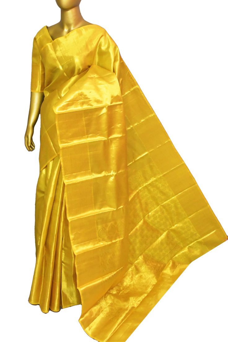 A rich collection in the tissue kanjeevaram silk saree range is here in our inventory. Buy this amazing collection with an elegant and maximized broad pallu and all-over zari work on the whole saree as well to make it look more relevant for any evening party. Color: A shade of golden yellow dual-toned color Technique: Amazing work of golden zari traditional weaving on the whole saree Fabric: Tissue Kanjeevaram Quality: Indyvogue's Assurance of Pure Silk Mark Certified Saree NOTE: Comes with matc Kanjeevaram Silk Saree, Color Techniques, Traditional Weaving, Kanchipuram Saree, Zari Work, Saree Fabric, Silk Sarees Online, Saree Online, Super Sale