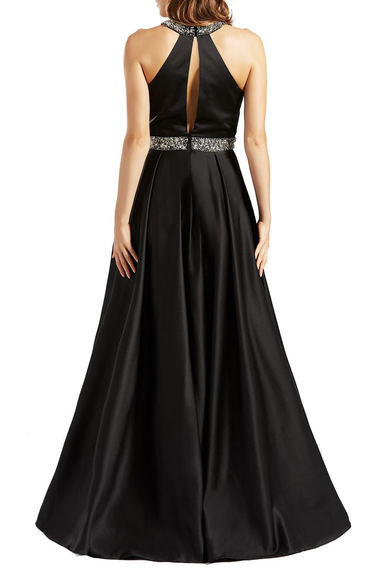 Here's a long Satin halter prom dress, ideal for galas and prom. This beautiful open-back satin evening dress has a lovely high-neck halter bodice with a rhinestone-embellished banded collar. A matching waistband sparkles as it crowns the lined a-line skirt that flows to a floor-length hem. Halter neckline. Beading. A line. With pocket. Floor length. Prom party. Evening gown. Militarty party. Black tie party. Galas. Pageant. Silhouette: A-Line Neckline: Halter Waist: Natural Hemline/Train: Floor Halter Prom Dresses Long, Halter Prom Dress, Halter Neck Gown, Satin Evening Dress, Satin Prom Dresses, Satin Ball Gown, Halter Prom Dresses, Black Tie Party, Formal Evening Gown