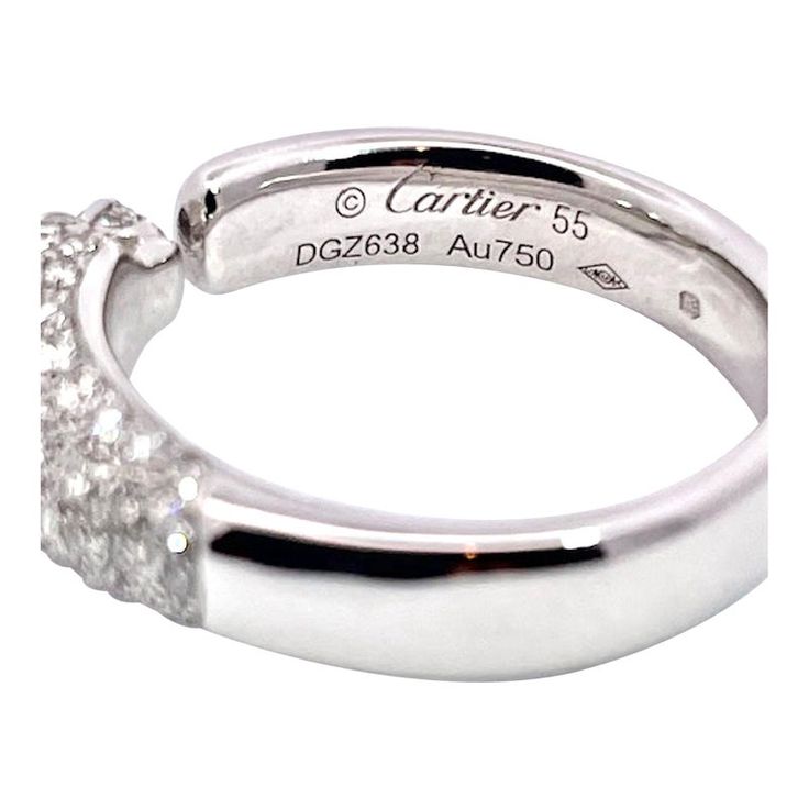 This is part of Chairish’s Fine Jewelry assortment.  Cartier Panthere Ring  This ring is new and a variation on the standard Diamond Head Panthere. It is smaller in diameter as it is thinner than the standard ring. Like most of the Panthere Collection has been revised and made smaller for less expensive pieces this is one. This is fully hallmarked Cartier 55 AU 750 DGZ 638. It is stackable as I said it is thinner than most and of course less expensive. This is 4.48mm the Head is 6.29mm it has em Cartier Panthere Watch Diamond, Cartier Panthere Watch Silver, Cartier Panther Ring, Cartier Necklace Panther, Cartier Panther, Emerald Eyes, Cartier Panthere, Diamond Head, Wedding Band Sets