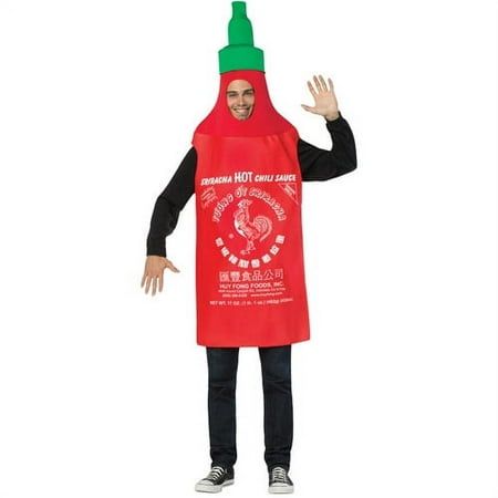 a man in a hot dog costume standing with his hands out and wearing a red apron