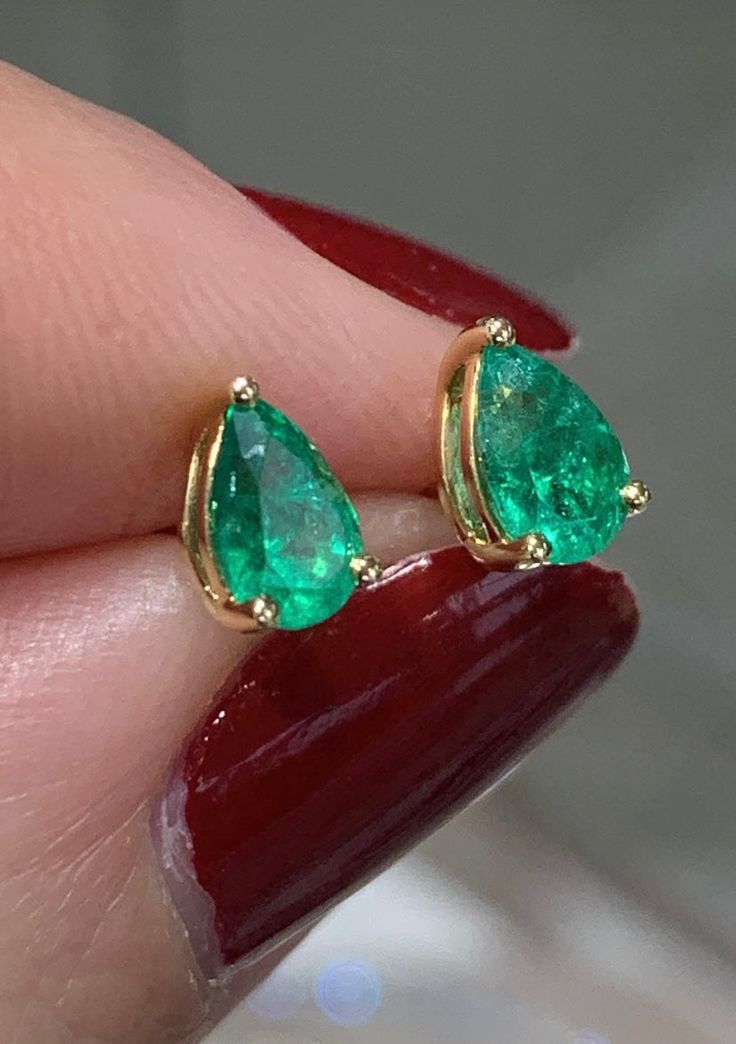 Vivid green pear shape emerald stud earrings are delicate and elegant. The color is so lovely and bubbly. Metal: 18K Yellow GoldEmerald Weight (2): 0.84ctwEarring Length: L 4mm x W 7mmBacking: Push Back Estimated production time is 4 - 5 weeks. Fine Jewelry Emerald Pear-shaped Earrings, Pear-shaped Emerald Earrings Fine Jewelry, Emerald Pear-shaped Fine Jewelry Earrings, Classic Emerald Pear-shaped Earrings, Classic Pear-shaped Emerald Earrings, Classic Green Pear Shaped Earrings, Classic Green Pear-shaped Earrings, Pear-shaped Green Gemstone Earrings, Green Pear-shaped Gemstone Earrings