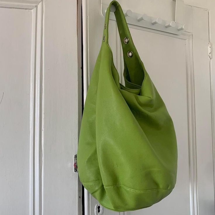 Lime green leather TODS bag. Excellent condition. Closes with popper, features zip at the back and interior. Measures: 320mm x 260mm base diameter. Perfect for everyday wear or for an occasion. Green Leather-lined Tote Shoulder Bag, Green Leather Lined Tote Shoulder Bag, Green Tote Shoulder Bag With Leather Lining, Green Hobo Bag With Zipper Closure For On-the-go, Modern Green Shoulder Bag With Leather Lining, Everyday Green Leather Shoulder Bag, Green Leather-lined Shoulder Bag For Shopping, Green Satchel Shoulder Bag With Leather Lining, Green Bucket Bag For Everyday Use