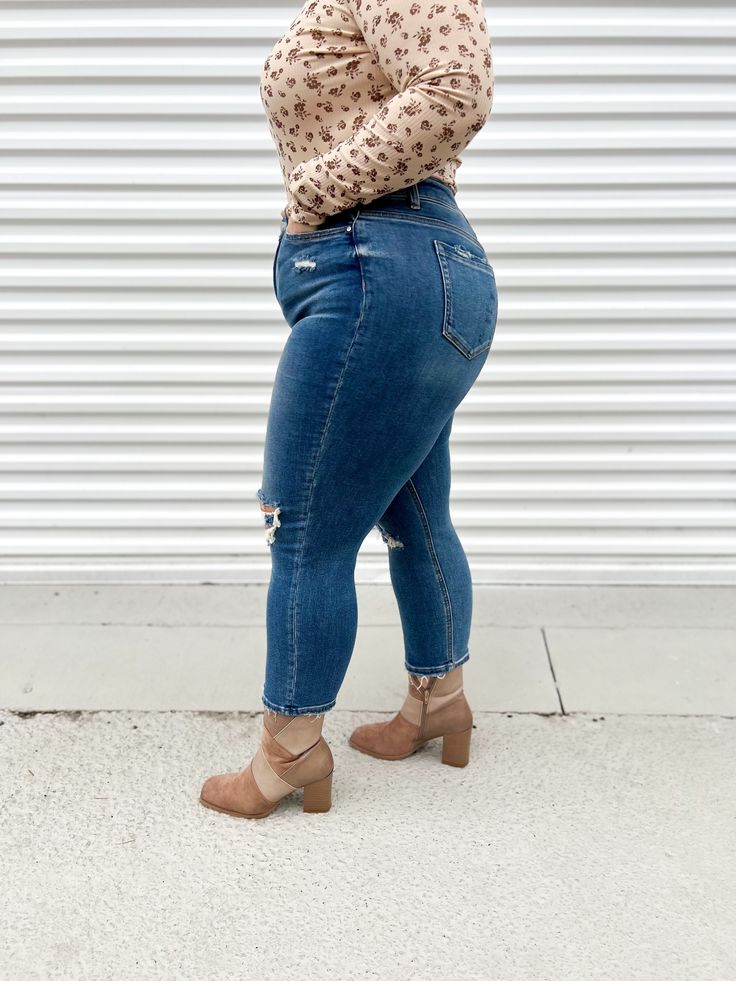 With our Lissner High Rise Mom Jeans, you'll never have to sacrifice comfort for style. The stretch material allows for a super high rise fit, making these jeans perfect for any occasion. Say goodbye to boring, uncomfortable jeans and hello to a new level of style and comfort! RISE: 11" INSEAM: 25.5" FABRIC:92%COTTON 6%POLYESTER 2%SPANDEX FIT: This denim is a staple! For those that are new to Mica sizing please take your "department store size" and size down ONCE for your perfect fit! MODEL SPEC High Rise Flare Jeans For Fall, Everyday Distressed Mid-rise Bottoms, Distressed Mid-rise Bottoms For Everyday, Mid-rise Distressed Bottoms For Everyday, High Rise Distressed Bottoms For Everyday, Everyday Mid-rise Distressed Bottoms, High Rise Medium Wash Jeans For Fall, Trendy Medium Wash Cropped Jeans For Fall, Everyday High Rise Distressed Bottoms