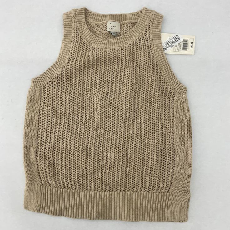 - Brand: A New Day - Color: Beige - Category: Women Women's Clothing Sweaters - Type: Sweater - Size: S - Style: Tank Pullover Sweater - Size Type: Regular - Department: Women - Material: Cotton Sku: A112-If2bkks5lpkws Beige Ribbed Sweater Vest For Fall, Cozy Knit Sweater Vest For Spring, Beige Crew Neck Sweater Vest For Spring, Ribbed Cotton Sweater Vest For Fall, Trendy Knit Sweater In Neutral Color, Beige Pointelle Knit Tops For Winter, Beige Pointelle Knit Sweater Vest For Spring, Trendy Neutral Knit Sweater, Spring Beige Pointelle Knit Sweater Vest